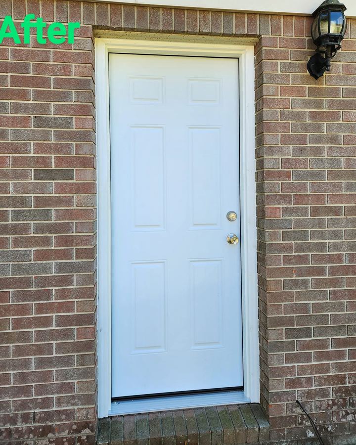 The same opening with a new six-panel door and fresh trim