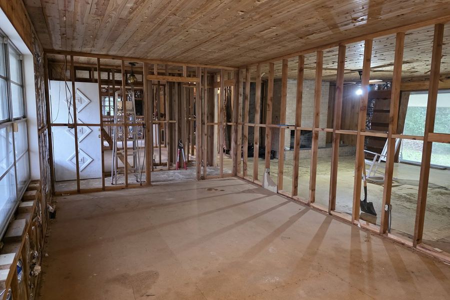 Whole room taken back to bare studs before new drywall