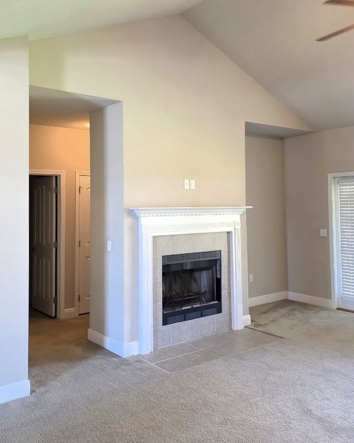 The same living room before, with carpet